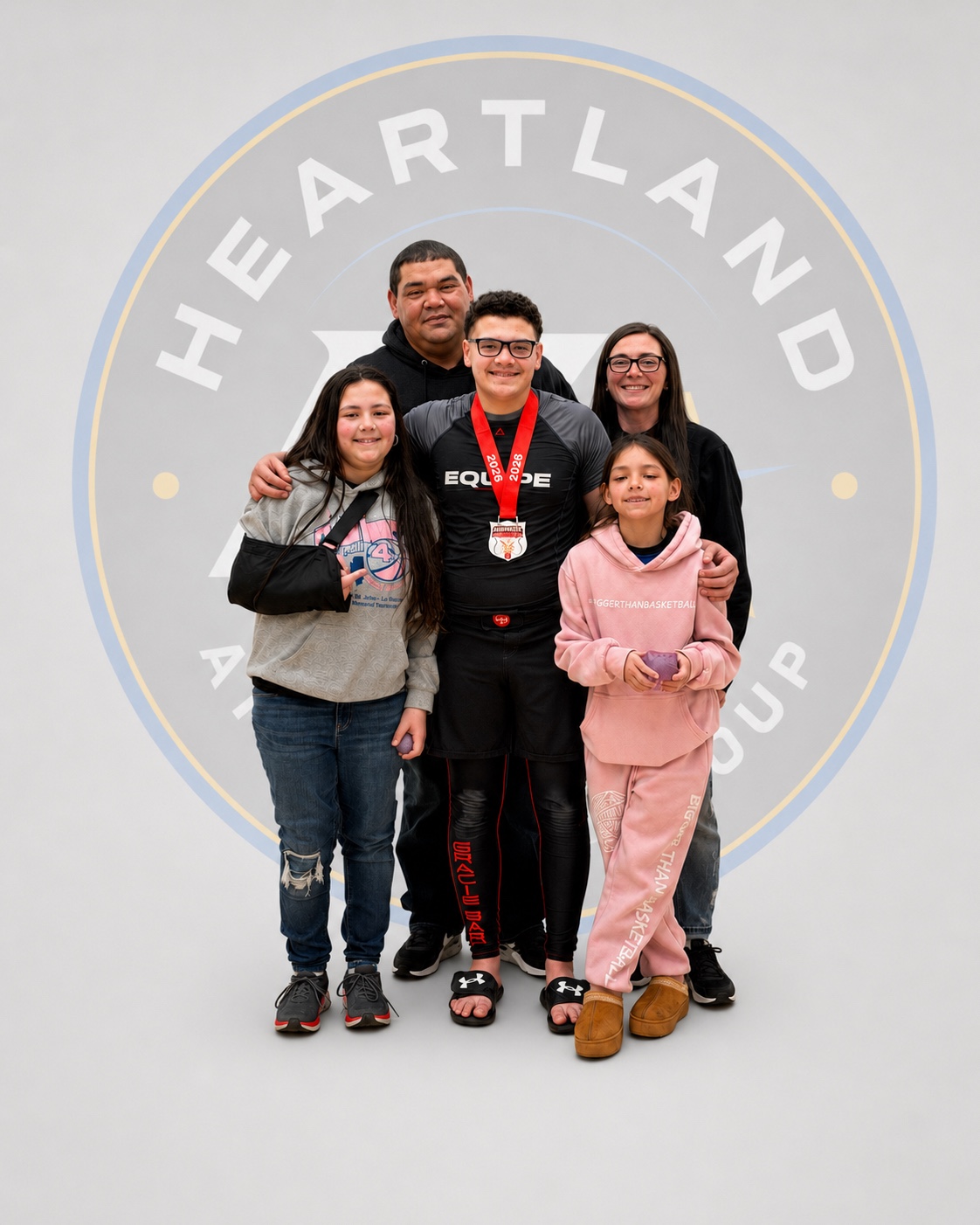 Family photo representing the inspiration behind Heartland Athletics Group